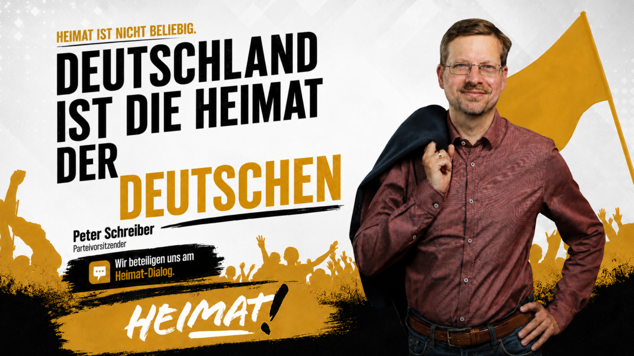 Peter Schreiber vor einer gelben Fahne mit der Aussage: „Heimat ist nicht beliebig. Deutschland ist die Heimat der Deutschen.“
