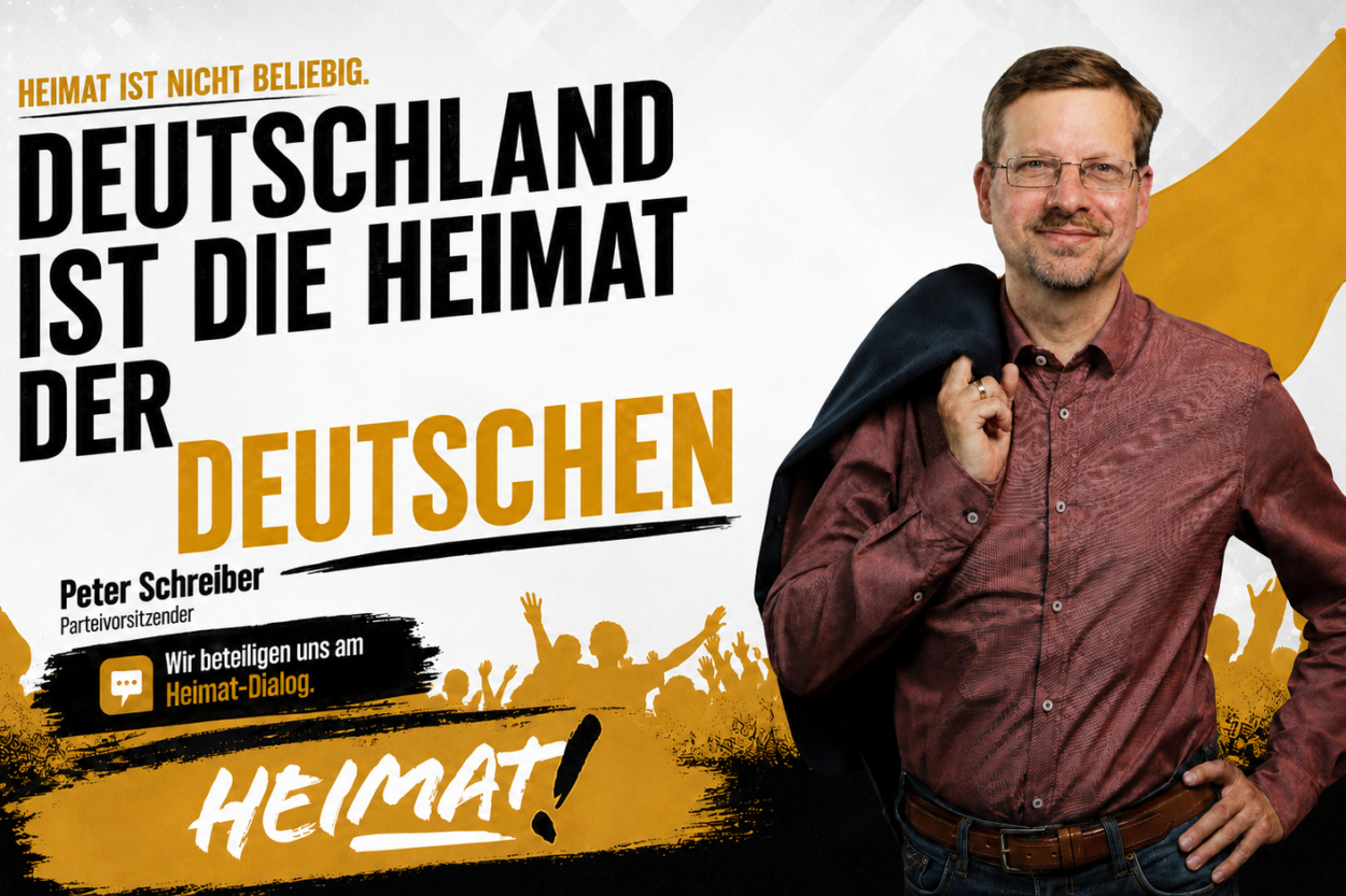 Peter Schreiber vor einer gelben Fahne mit der Aussage: „Heimat ist nicht beliebig. Deutschland ist die Heimat der Deutschen.“